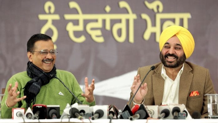 File photo of Aam Aadmi Party chief and Delhi CM Arvind Kejriwal with AAP's Punjab CM candidate and Sangrur MP Bhagwant Mann, in Mohali | ANI