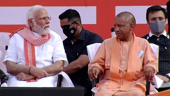 Prime Minister Narendra Modi during the swearing-in ceremony of Yogi Adityanath as Chief Minister of Uttar Pradesh, at the Atal Bihari Vajpayee Ekana Cricket Stadium in Lucknow on 25 March 2022. | Photo: ANI