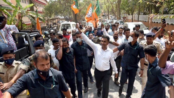 Goa Chief Minister Pramod Sawant waves to supporters on his victory from Sanquelim seat defeating Congress leader Dharmesh Saglani, in Panaji | ANI