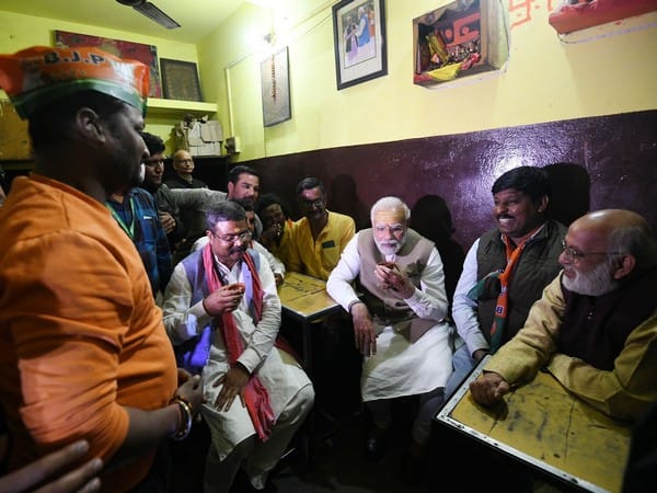 PM Modi stops for 'chai pe charcha' during roadshow in Varanasi