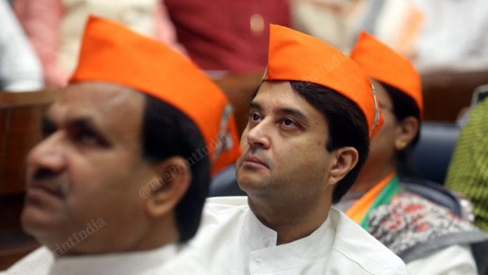 Aviation minister Jyotiraditya Scindia wearing BJP cap at the event | Photo: Praveen Jain | ThePrint