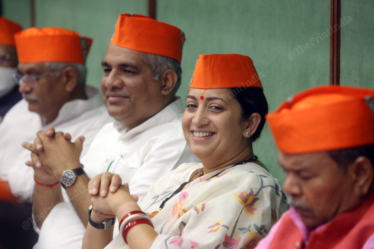 Union Minister Smriti Irani smiles as she attends the BJP's 42nd Foundation Day event at Parliament Annexe | Photo: Praveen Jain | ThePrint