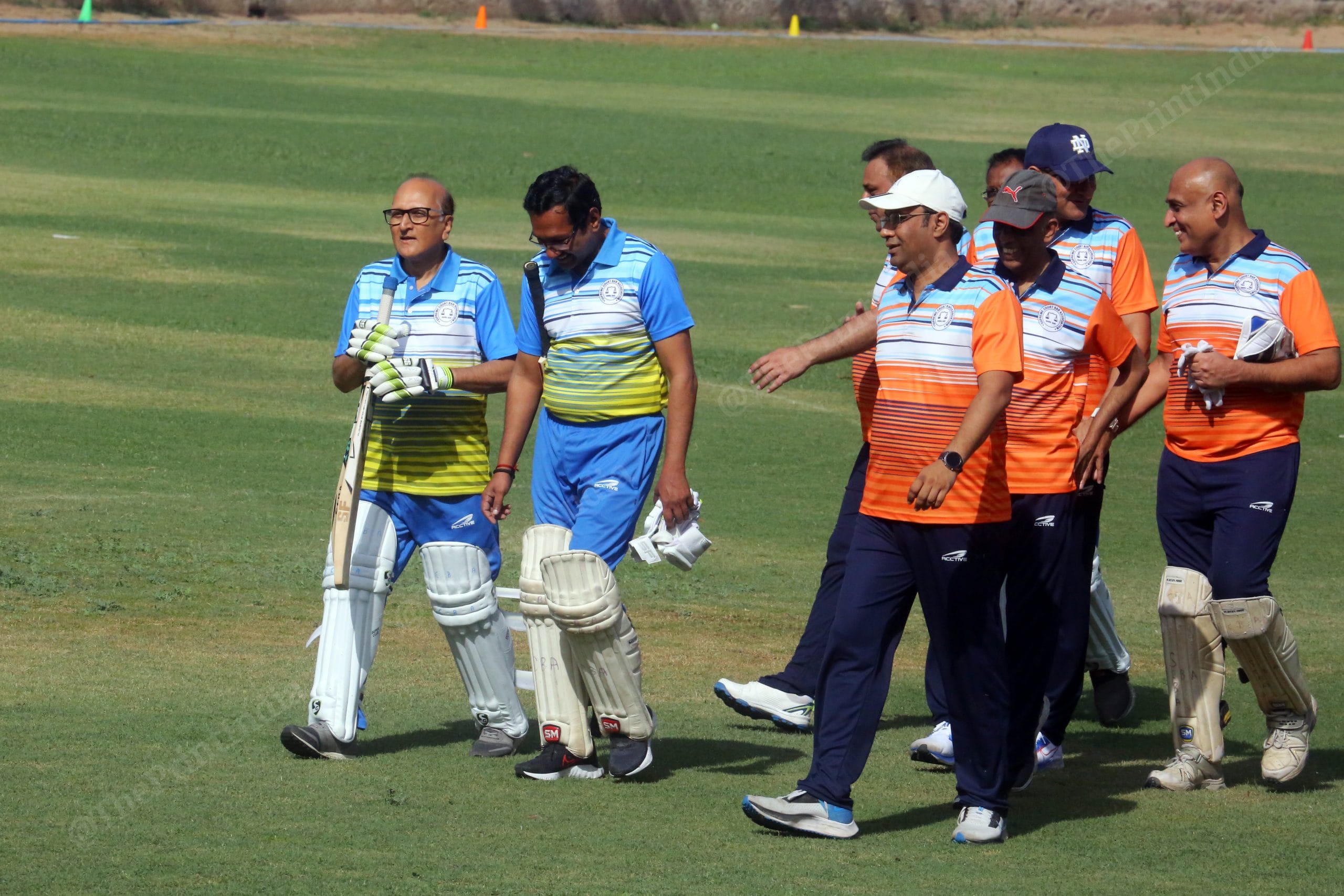 Justice Shripathi Ravindra Bhat, with Justice M. M. Sundresh, leave the field after the 1st innings | Photo: Praveen Jain | ThePrint