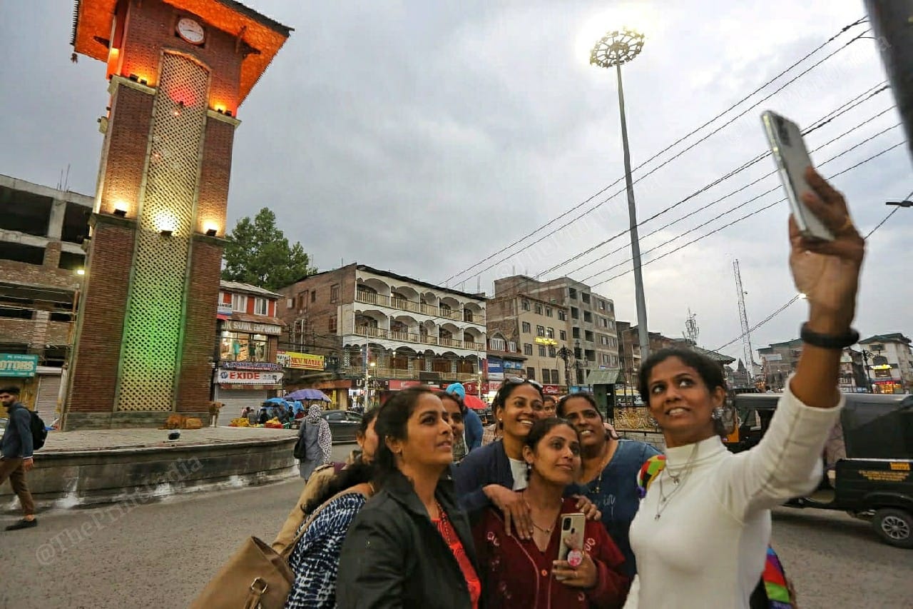 Tourists from Bengaluru at Lal Chowk in Srinagar | Photo: Praveen Jain | ThePrint