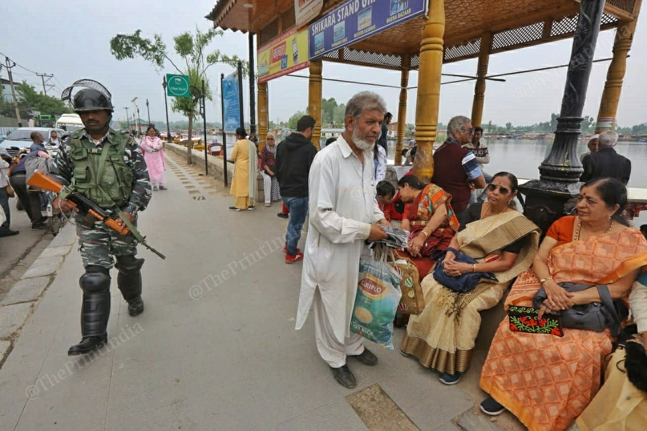 A CRPF trooper on patrol at Dal Lake | Photo: Praveen Jain | ThePrint