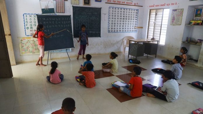 Gita Heerabhai Rabbari and Vanita Kayabhai Rabbari teach students of classes 1 to 3 in the primary school of Angiya Nana village in Kachchh district. The school’s only teacher is handling administrative work in another room | Manisha Mondal | ThePrint