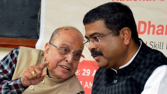Union Minister for Education Dharmendra Pradhan in conversation with former ISRO Chairman K. Kasturirangan at the release of the mandate document for the NCF at  IISc in Bengaluru | ANI photo 