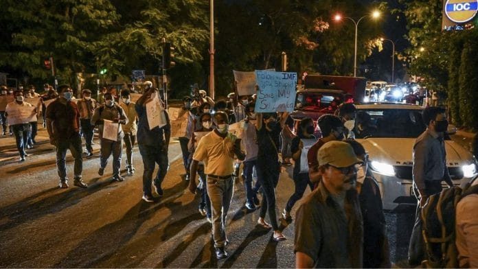 Protestors hold a demonstration against the surge in prices and shortage of fuel and other essential commodities in Colombo, on 1 April 2022 | Photographer: Ishara S. Kodikara/AFP/Getty Images via Bloomberg