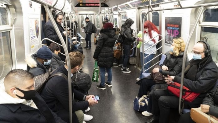 Passengers wearing masks in the subway | Photographer: Eilon Paz | Bloomberg