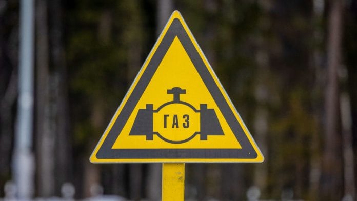A gas pipeline marker post above the ground on the Gazprom PJSC Chayandinskoye oil, gas and condensate field, a resource base for the Power of Siberia gas pipeline, in the Lensk district of the Sakha Republic, Russia| Photographer: Andrey Rudakov/Bloomberg