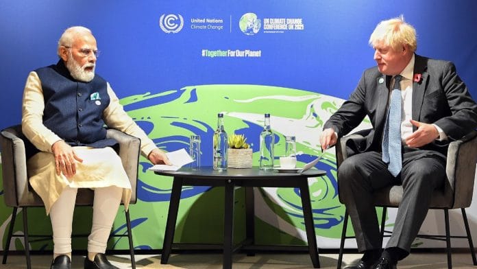 File photo of Prime Minister Narendra Modi and UK Prime Minister Boris Johnson on the sidelines of COP26 World Leaders' Summit in Glasgow | ANI