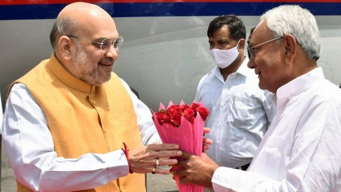 Nitish Kumar with Amit Shah at Patna's Jay Prakash Narayan International Airport Saturday | ANI