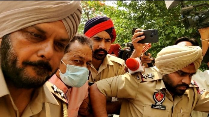 Ex-Shiv Sena (Bal Thackeray) leader Harish Singla being produced at the District Court in Patiala on Saturday where he has given two days’ police remand. | Urjita Bhardwaj