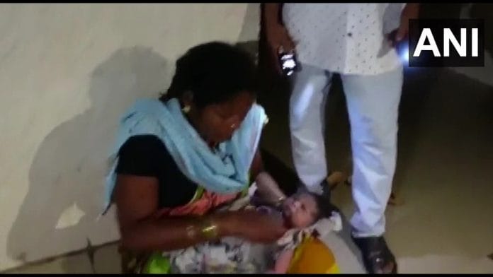 A baby born in Andhra Pradesh's NTR Government Hospital amid a blackout due to shortage of power in the state | ANI