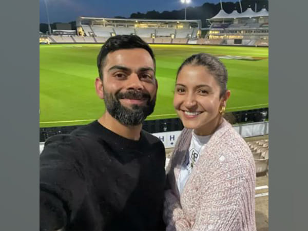 Anushka-Virat pose for a happy picture at fellow player Glenn Maxwell's wedding reception