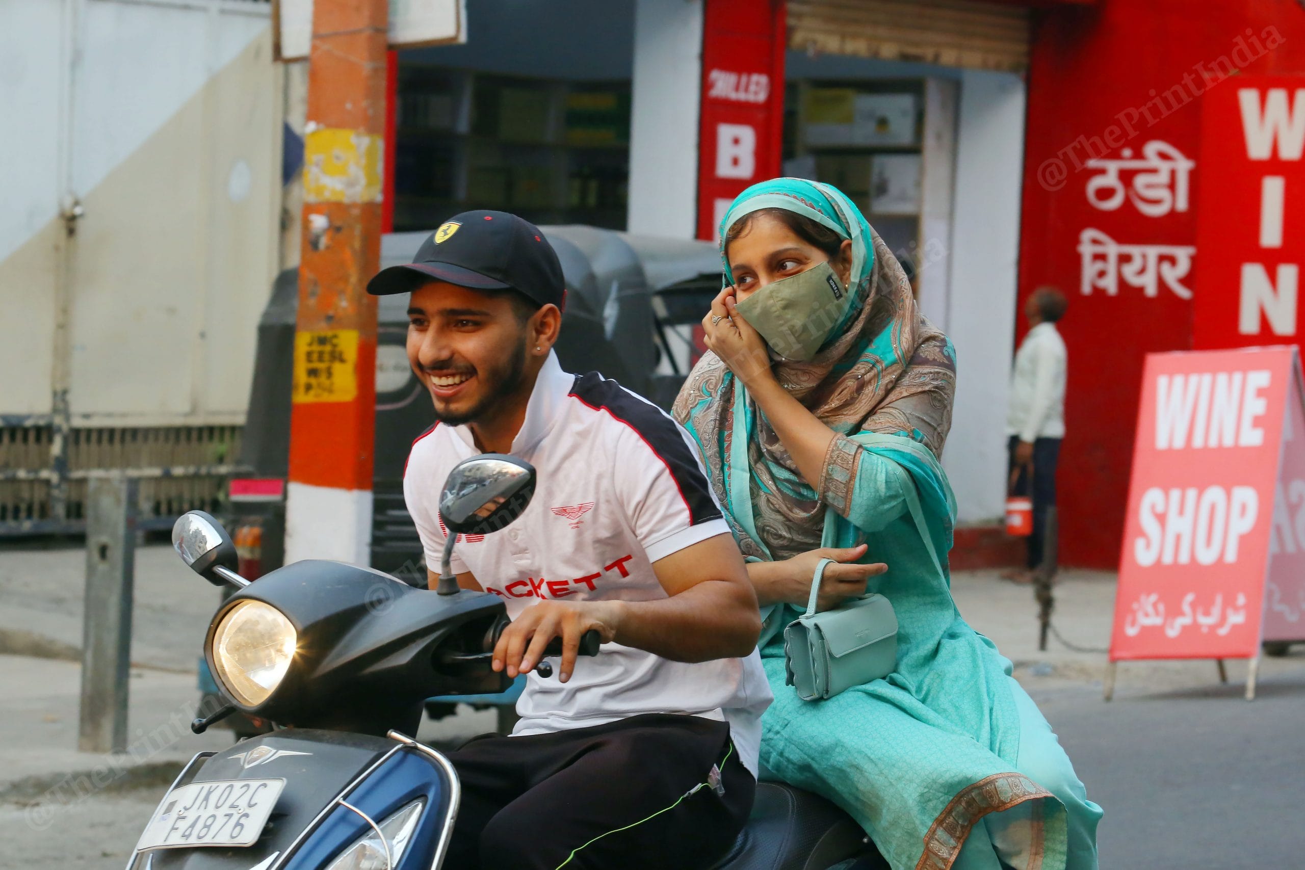 Ateeb Tabish ( Umran Malik chilhood friend) with Shehnaz (foster sister and umran sister) going home in srinagar | Photo: Praveen Jain | ThePrint