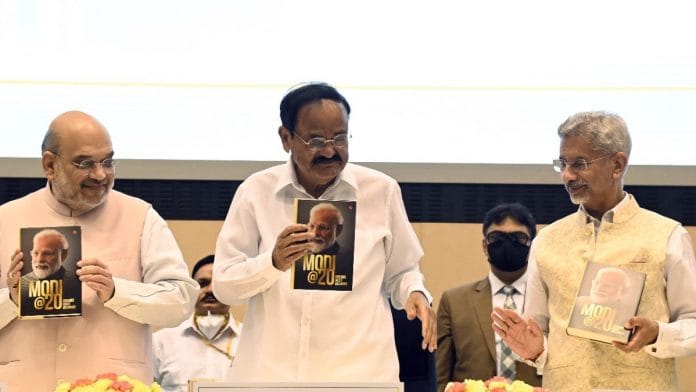 Minister of Home Affairs Amit Shah, Vice President of India Venkaiah Naidu, and Minister of External Affairs S. Jaishankar at the launch of a book titled 'Modi@20: Dreams Meet Delivery' at Vigyan Bhawan in New Delhi | Photo: ANI