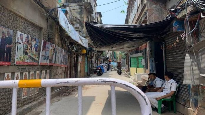 Kolkata Police stand guard outside Durga Pithuri Lane in Kolkata's Bowbazar | Photo: Sreyashi Dey | ThePrint |