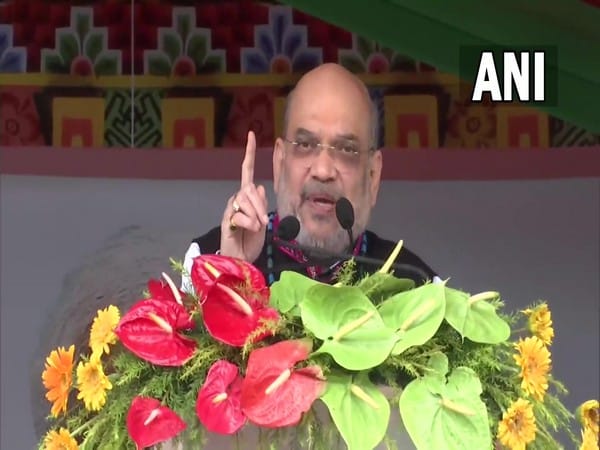 Amit Shah asks Rahul Gandhi to take off 'Italian glasses' to see development  