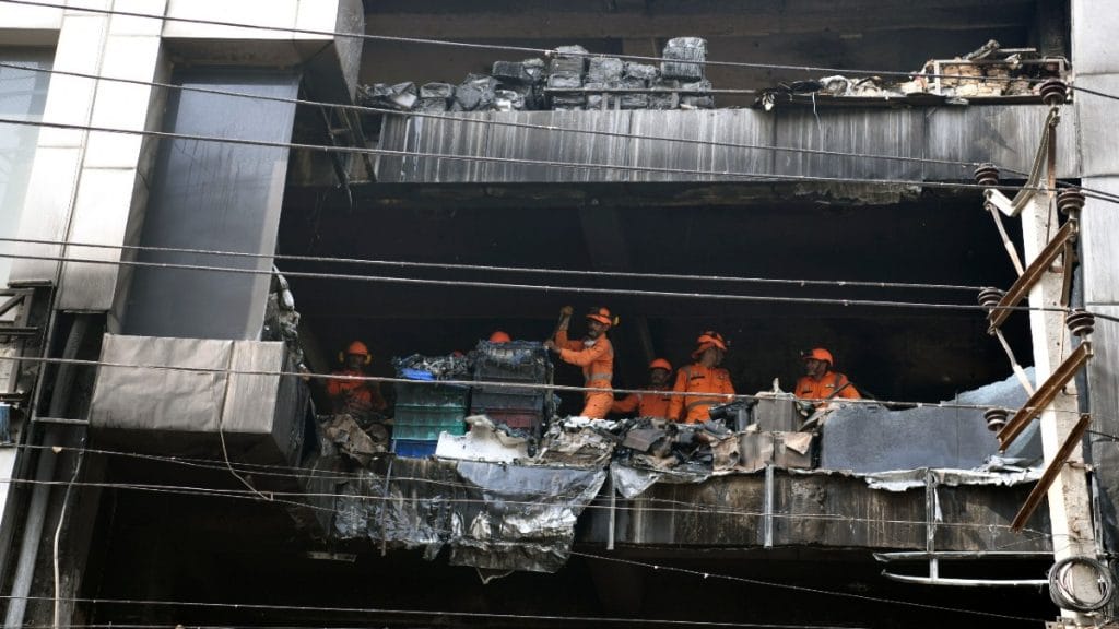 NDRF personnel at the four-storey building in Mundka | ANI