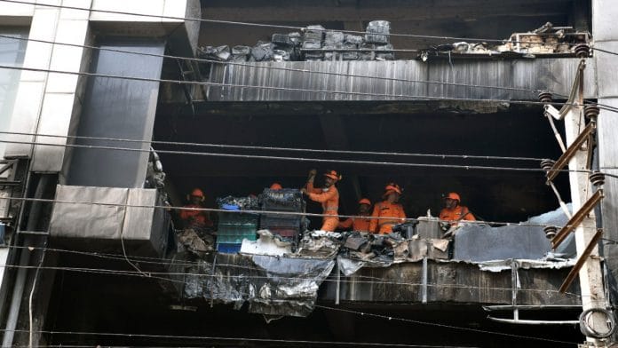 NDRF personnel at the four-storey building in Mundka | ANI