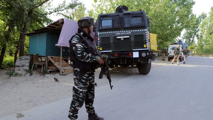Representational image | A security personnel stands guard near an encounter site in Pulwama | ANI Photo