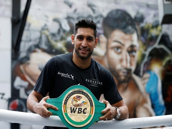 Legendary British boxer and former world champion Amir Khan announces retirement
