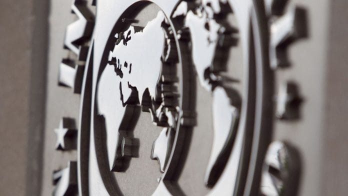 International Monetary Fund logo displayed out the headquarters in Washington, DC | Bloomberg