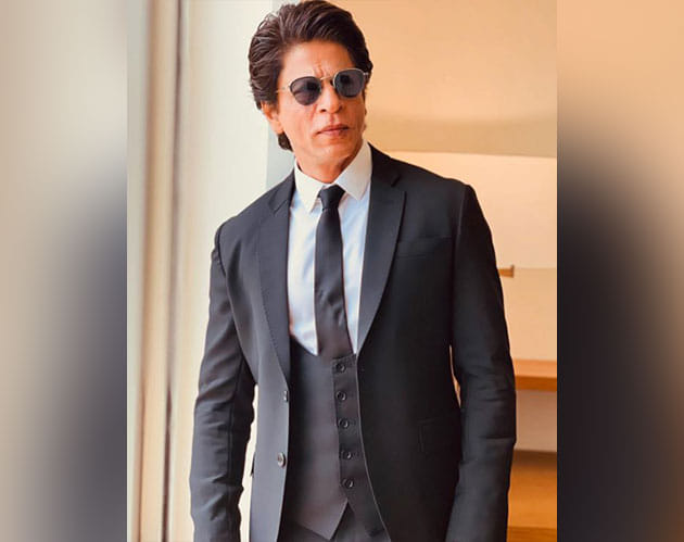 Shah Rukh Khan dons dapper black suit for Delhi visit