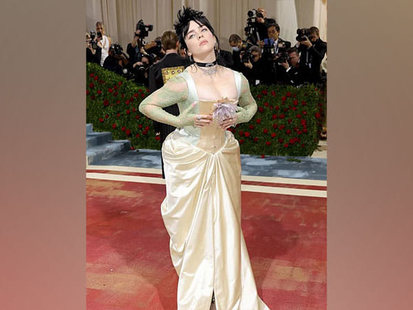 Billie Eilish arrives for 2022 Met Gala event dressed in silky corset gown