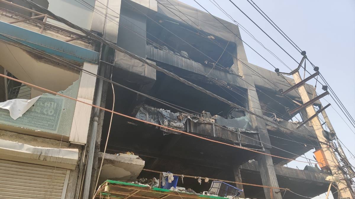 The blackened facade of the building after the fire was extinguished | Photo: Bismee Taskin | ThePrint