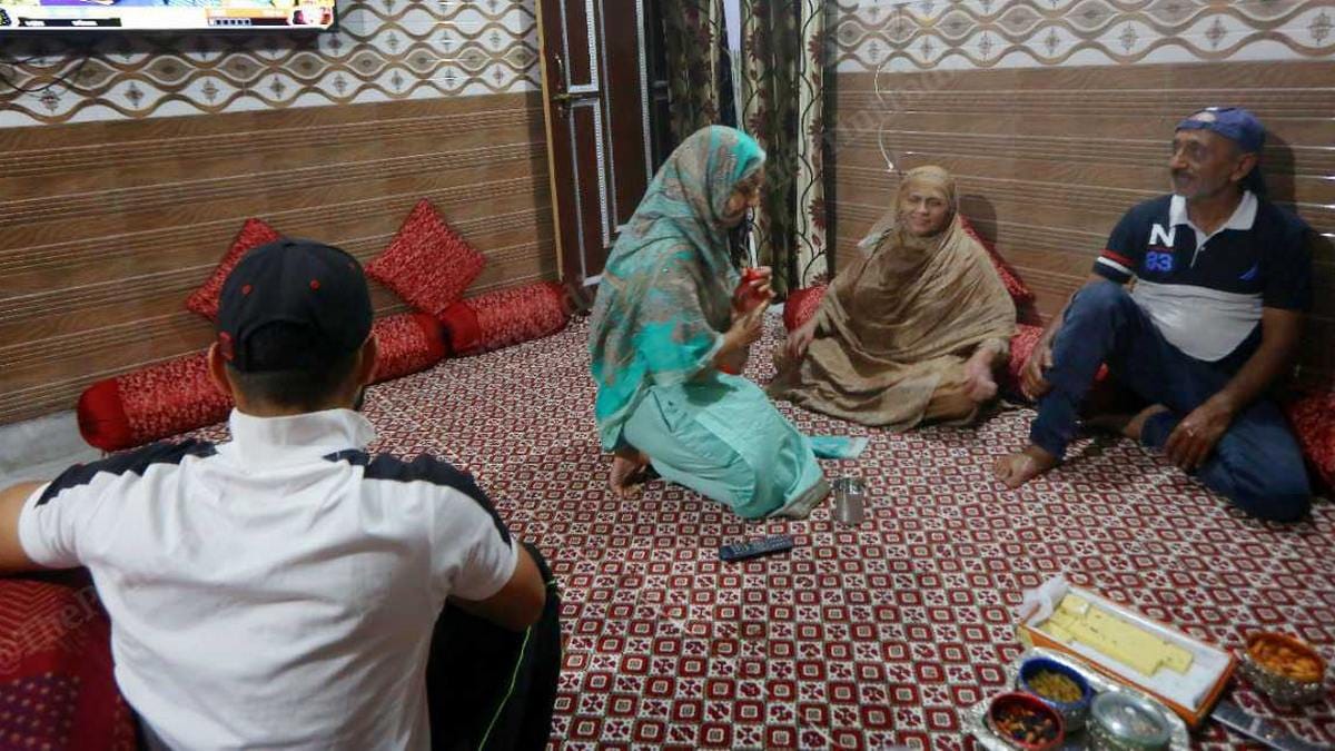 (From right) Umran Malik's father Abdul Rashid, mother Seema Begum, sister Shehnaaz and friend Ateeb Tabish watch the IPL at the family's home in Jammu | Photo: Praveen Jain | ThePrint
