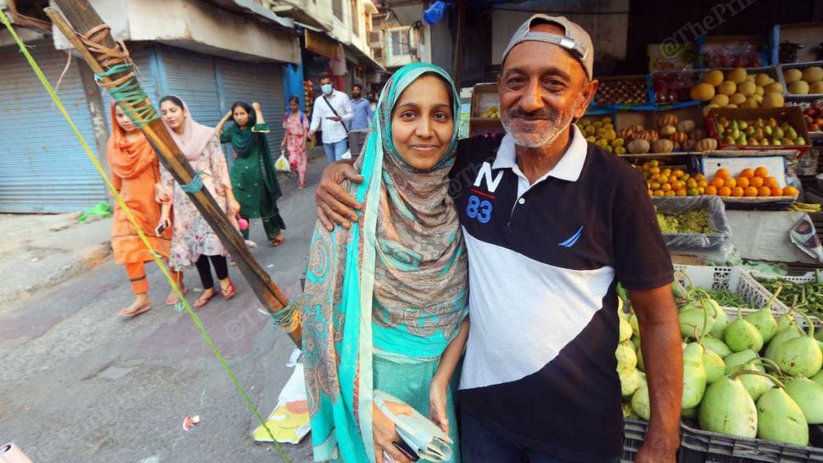 Shehnaaz with dad Abdul Rashid at his stall | Photo: Praveen Jain | ThePrint