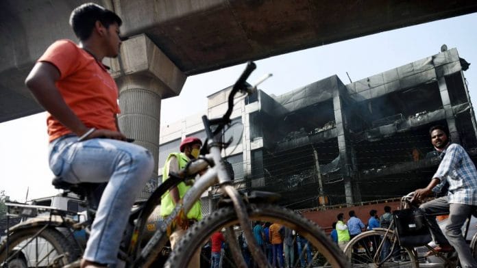 The four-storey building where a fire broke out that left at least 27 persons dead and 12 injured near Mundka Metro station in Delhi | Photo: ANI