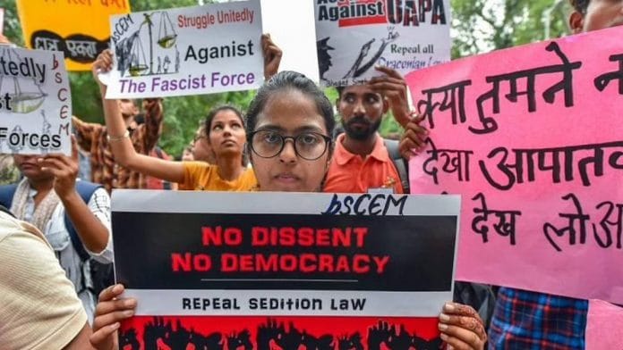 File image of activists displaying placards during a protest in New Delhi | Photo: Kamal Kishore | PTI