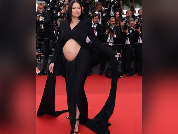 Brazilian model Adriana Lima flaunts baby bump at 'Top Gun: Maverick' Cannes premiere