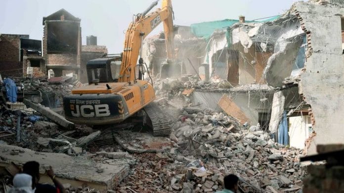 File photo of Javed Mohammed's house being demolished in Prayagraj | ANI