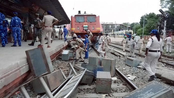Paramilitary and police personnel at Patna's Danapur railway station, which was vandalised by youth protesting against the central government's Agnipath recruitment scheme for the armed forces Friday | ANI