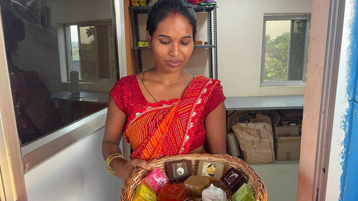 A woman holds up soaps made at Kalpataru Multi-Utility Centre | Photo: Ishadrita Lahiri | ThePrint