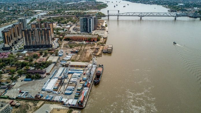 An aerial view shows a railway bridge over the Volga river and a port in the Russian city of Astrakhan | Photo | Andrey Borodulin | AFP/Getty Images via Bloomberg