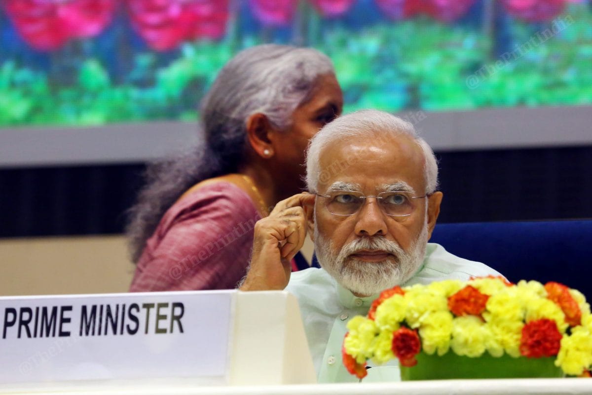 Finance Minister Nirmala Sitharaman, seen in the background here, was among the participants at the event | Photo: Praveen Jain | ThePrint