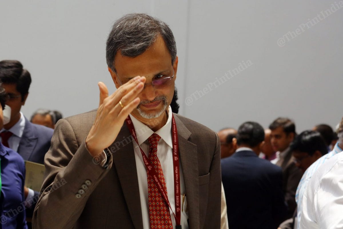 Nageswaran interacts with others during a tea break at the event | Photo: Praveen Jain | ThePrint