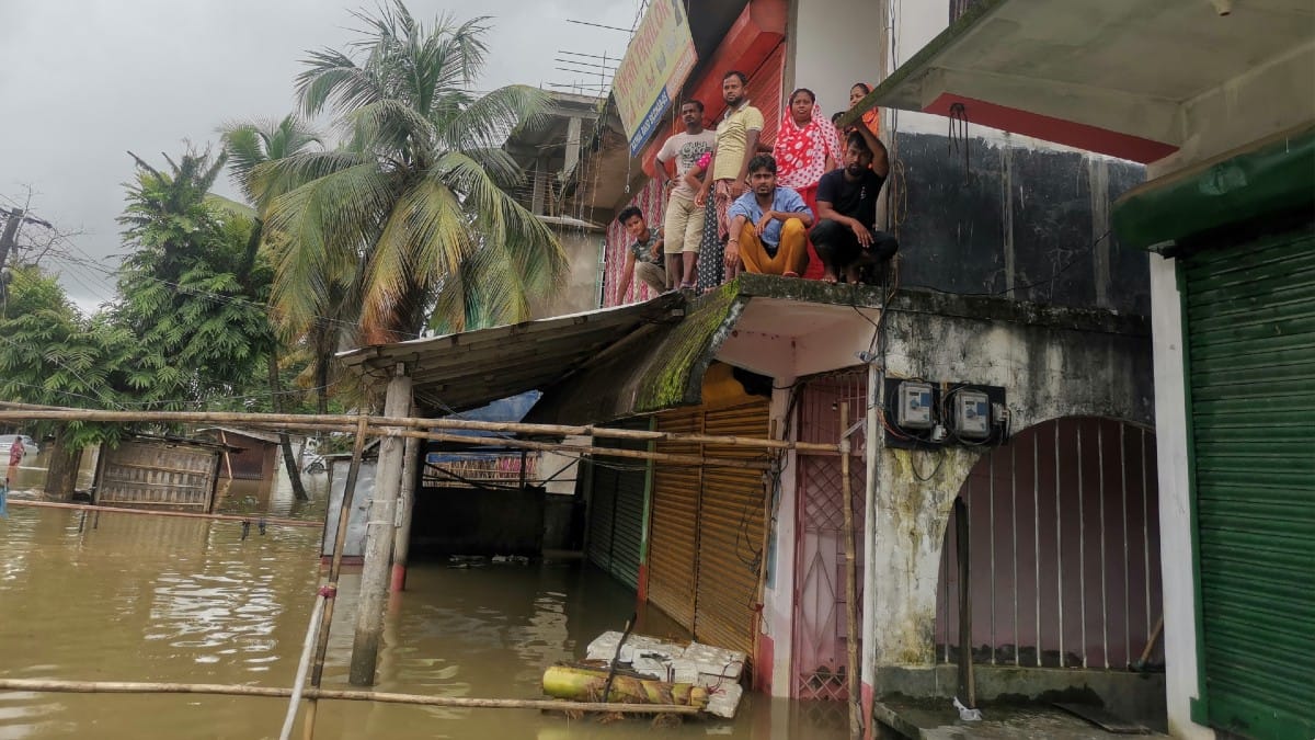 A group of people stranded in the flood | Photo: Angana Chakrabarti | ThePrint