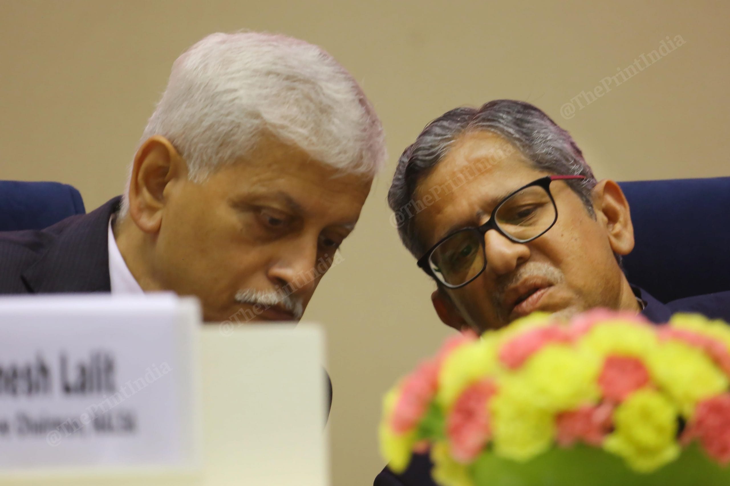 Chief Justice of India N.V. Ramana talking to upcoming CJI Uday Umesh Lalit during an event at Vigyan Bhawan | Praveen Jain | ThePrint