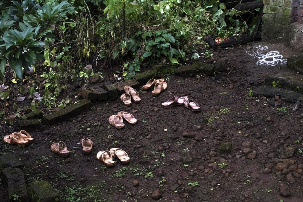 The slippers left outside the classroom talk about the imprint of hope and dignity left by these grandmothers | Jayati Saha