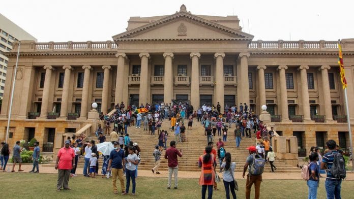 Protestors outside Sri Lanka's Presidential Secretariat amid worsening economic crisis at Galle Face in Colombo, on 9 July 2022 | PTI