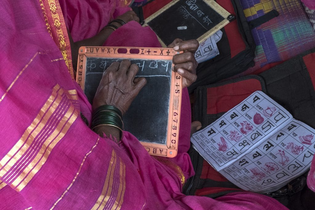 Every student takes great care in writing and learning the alphabet so that they can sign their names | Jayati Saha