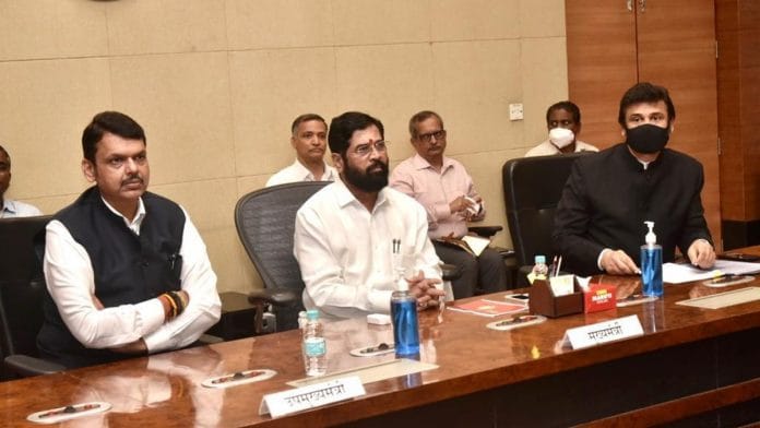 Maharashtra Chief Minister Eknath Shinde (middle) and his deputy Devendra Fadnavis (left) at the Mantralaya Thursday in Mumbai | Twitter | @mieknathshinde