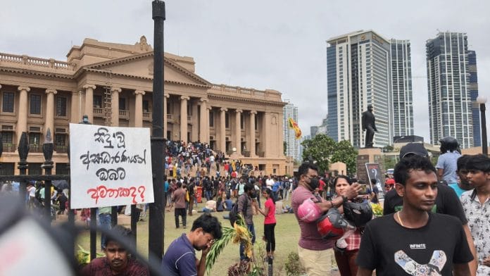 People outside the Presidential Secretariat in Colombo on 10 July | ThePrint | Regina Mihindukulasuriya