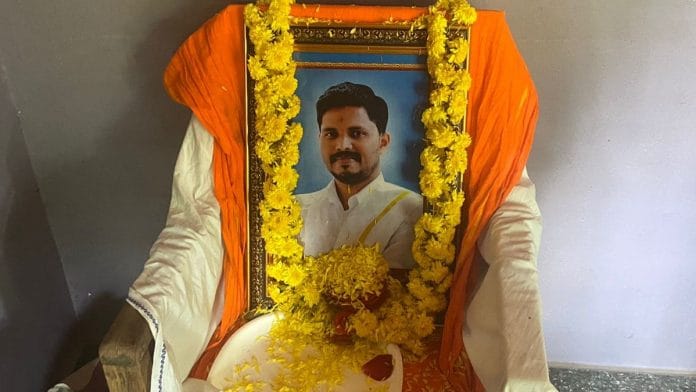 Praveen Nettaru's photo at his house in Bellare | Photo: Madhuparna Das | ThePrint